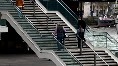 Climbing-Up-The-Stairs-Within-Southbank,-London,-United-Kingdom