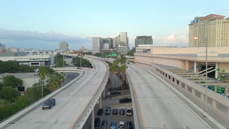 Cars-driving-on-bridge-highway-arriving-to-Tampa-downtown