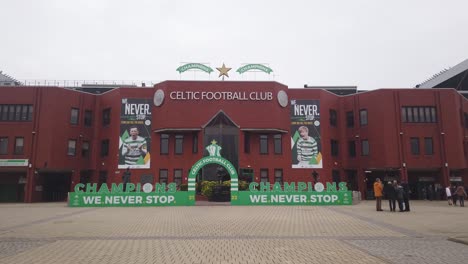 A-group-of-people-outside-Celtic-Park-on-a-cold-night