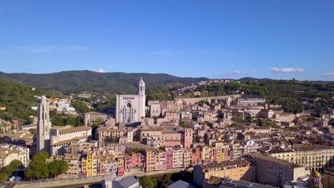Aerial-shot-of-Girona-city-in-Spain-with-picturesque-colorful-houses