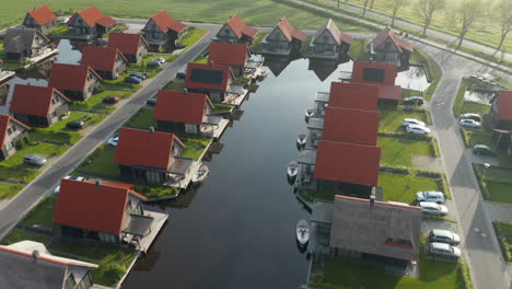 Luxurious-Holiday-Resort-And-Polder-With-Boats-On-Jetty-At-Waterstaete-Ossenzijl-In-Netherlands