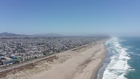 Descending-and-panning-aerial-shot-of-Ocean-Beach-in-San-Francisco