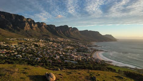 Beautiful-sunset-at-Camps-Bay-Beach-in-Cape-Town-South-Africa,-aerial