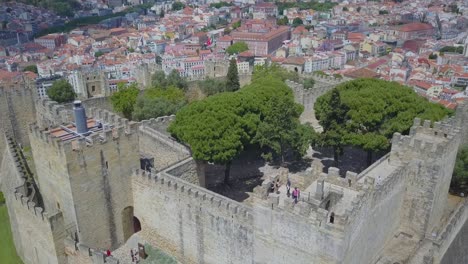 Aerial-drone-footage-of-the-Lisbon-medieval-castle-in-the-medieval-old-town-in-Portugal-capital-city