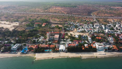 Aerial-panning-view-of-Ham-Tien-with-rising-sea-level-and-coastal-erosion