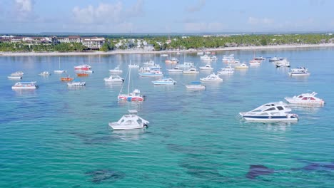Leisure-boats-anchored-in-tropical-azure-Caribbean,-Playa-Bavaro