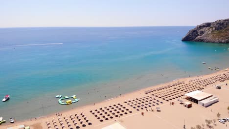 View-From-Above-Of-Tsambika-Beach-And-Waterpark-On-Rhodes-Island-In-Greece-In-Summer