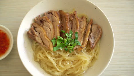 dried-noodles-with-stewed-duck-in-white-bowl---Asian-food-style