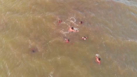 Aerial-Birds-Eye-View-Of-Male-Rescuers-Swimming-For-Flood-Rescue-Training-In-Balochistan-In-The-Arabian-Sea