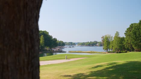 Camera-Dolly-Right-to-Reveal-Open-Grassy-Area-on-Golf-Course-in-Cornelius,-North-Carolina