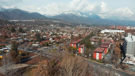 -Neighborhood-In-Las-Condes-With-Sight-Of-Mallplaza-Los-Dominicos-And-Majestic-Background-Of-Andes-Mountain-In-Santiago-City,-Chile