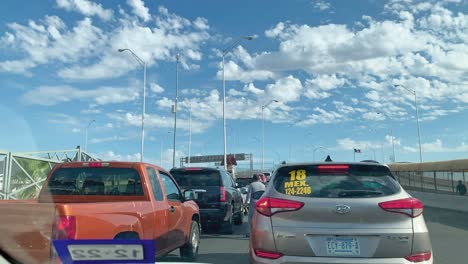 Daylight-Shot-Of-Border-Traffic-Waiting-In-Line-At-Cordova-Bridge-Of-The-Americas-International-US-Mexico-Border-Bridge-in-El-Paso,-Texas-USA-As-Seen-From-Interior-Driver-Seat