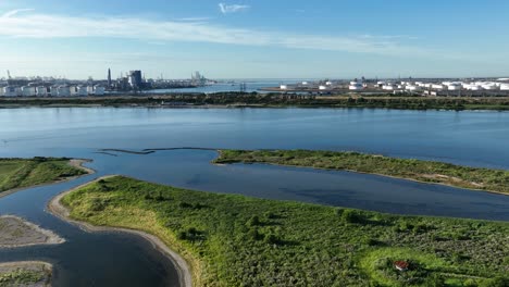Green-marshes-at-Oostvoornse-Meer-Aerial-Drone-Fly-Above-Rotterdam-Port-Holland