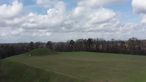 Wide-reverse-pullback-aerial-shot-of-the-Native-American-religious-site-Emerald-Mound-in-Mississippi