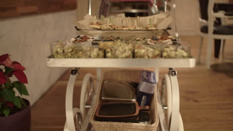 Tapas-served-on-a-wheel-table-in-italian-restaurant