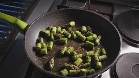 Chopped-Asparagus-Cooking-And-Stirred-In-A-Skillet