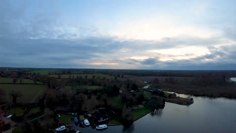 Aerial-footage-of-a-Norfolk-Broad,-the-Weir-in-South-Walsham