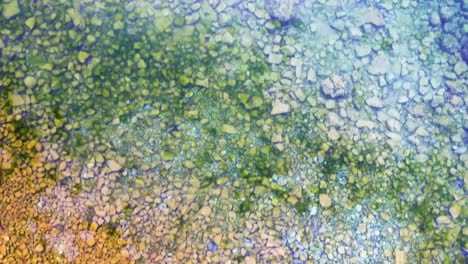 From-shallow-to-deep-drone-shot-of-very-clear-water
