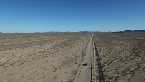 Car-on-desert-Highway-Aerial