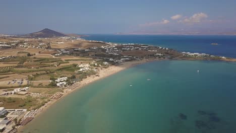Wide-establishing-drone-shot-of-Golden-Beach-on-Paros-island,-Greece