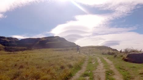 Lenticular-clouds-on-a-hike-up-Rocky-Mountain-near-Wanaka,-New-Zealand