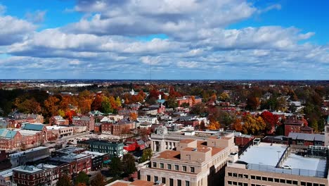 Beautiful-footage-flying-over-downtown-Lexington-Kentucky-with-all-of-fall-foliage-and-amazing-sky