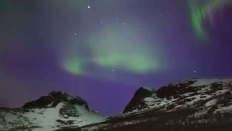 colorful-winter-aurora-in-mountainous-landscape