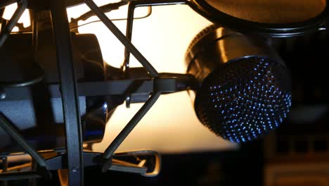 Slow-right-panning-shot-of-studio-microphone-close-up