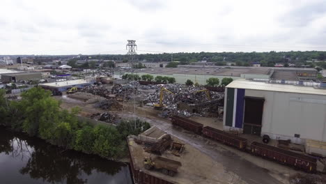 Aerial-Footage-of-metal-recycling-plant-on-the-Mississippi-River