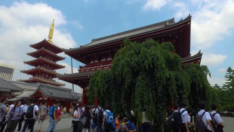 The-view-of-the-Sensoji-Temple-and-tower-with-clouds-and-crowds
