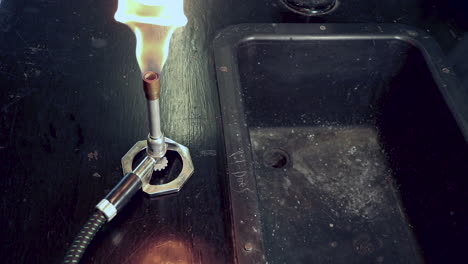 Lighting-a-bunsen-burner-with-a-sparker-and-too-much-propane