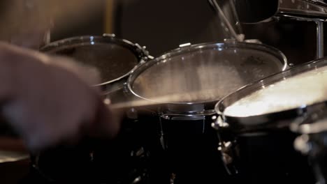 A-drummer-hitting-toms,-playing-a-beat