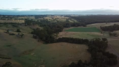 Aerial-view-over-landscape-near-the-Upper-Coliban-Reservoir,-Victoria,-Australia,-January-2019
