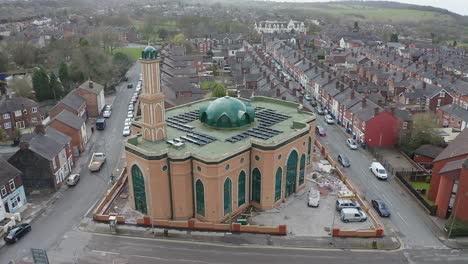Aerial-view-of-Gilani-Noor-Mosque-in-Longton,-Stoke-on-Trent,-Staffordshire,-the-new-Mosque-being-built-for-the-growing-muslim-community-to-worship-and-congregate