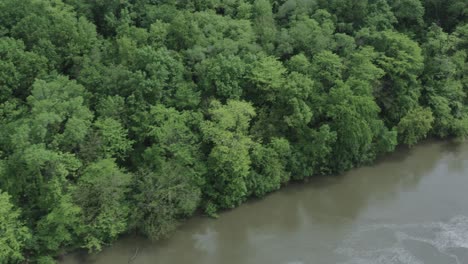 Drone-flyover-rolling-midwestern-river-in-the-summer