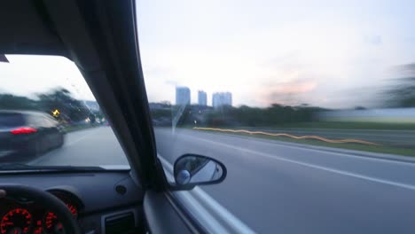 POV-shot-of-speeding-and-stopping-at-traffic-jam-on-the-road-in-the-afternoon