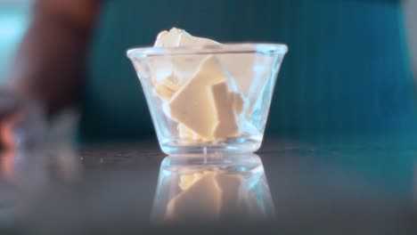 Butter-spinning-in-slow-motion-on-a-marble-table