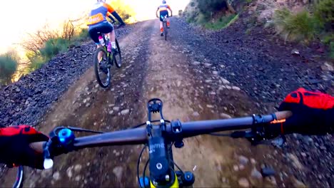 GOPRO-POV-of-mountain-biker-climbing-a-gravel-technical-road