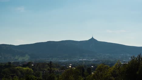 Timelapse-of-Liberec-city-in-Czech-Republic-with-Jested-tower-in-a-background,-static-landscape-view