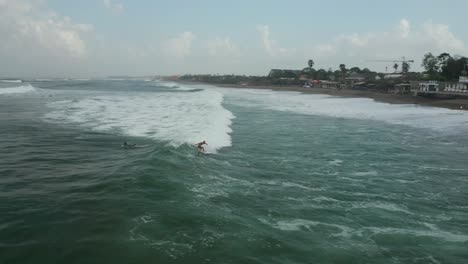 Wave-Surfing-in-Indian-Ocean-in-Twilight,-Aerial