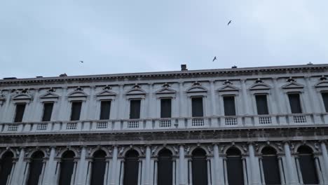 Look-up-of-the-facades-at-St-Mark's-square-in-Venice,-Italy