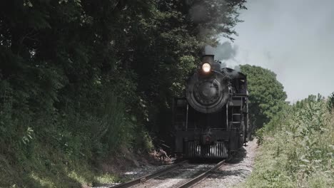 Vintage-Steam-Engine-Approaching-Head-on-with-a-full-Head-of-Steam