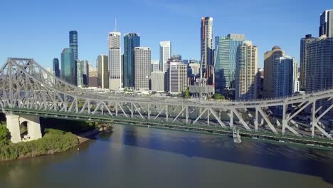 The-Story-Bridge-and-Brisbane-Riverside-precinct---a-stunning,-aerial-drone-shot-pulling-back-and-changing-perspective