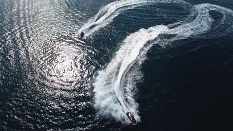 Couple-of-Jet-Ski-Scooters-on-Fast-Ride-on-Tropical-Sea-Water-Surface,-Birdseye-Aerial-View