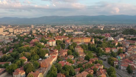 Flying-over-the-old-houses-in-Plovdiv,-one-of-the-oldest-cities-in-Europe