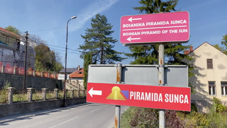 Street-sign-shows-the-path-to-the-sun-pyramid-in-Visoko-city,-Bosnian-tale-of-pyramids-in-Bosnia-and-Herzegovina