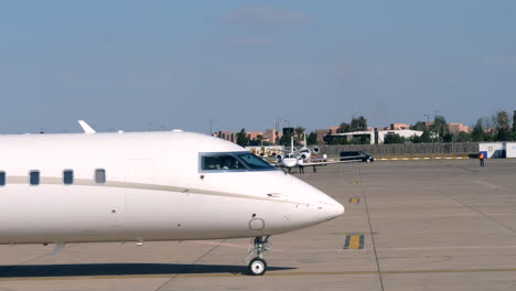 Private-Jet-Parking-at-Marrakech-Airport,-Taxiing-into-Frame