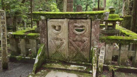 Old-historical-Cemetery-Oku-no-In-with-tombstones,-located-in-Koyasan---a-small-town-in-Japans-prefecture-Wakayama