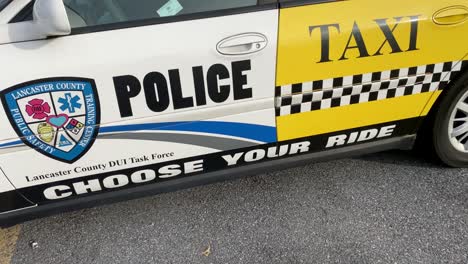 Police-taxi-cruiser,-drunk-driving-themed-car-warns-of-dangers-of-driving-while-under-the-influence