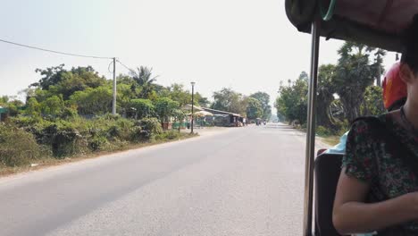 Close-Shot-of-Riding-in-a-Tuk-Tuk-in-Cambodia-Heading-Out-of-Town-and-into-the-Countryside